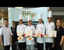 IRON CHEFS:Liew(centre) dispaly his winning dish together with judges and participants (from left) Lao, Dorge, Chin, Sim, Muneeb and Joseph